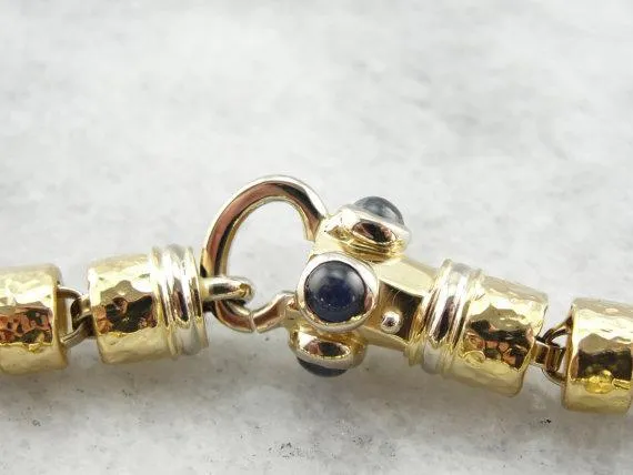 18 Karat Yellow Gold Bracelet with Faceted Links and Decorative Clasp