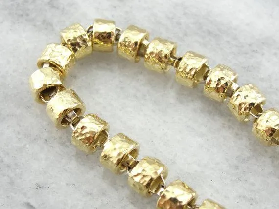 18 Karat Yellow Gold Bracelet with Faceted Links and Decorative Clasp